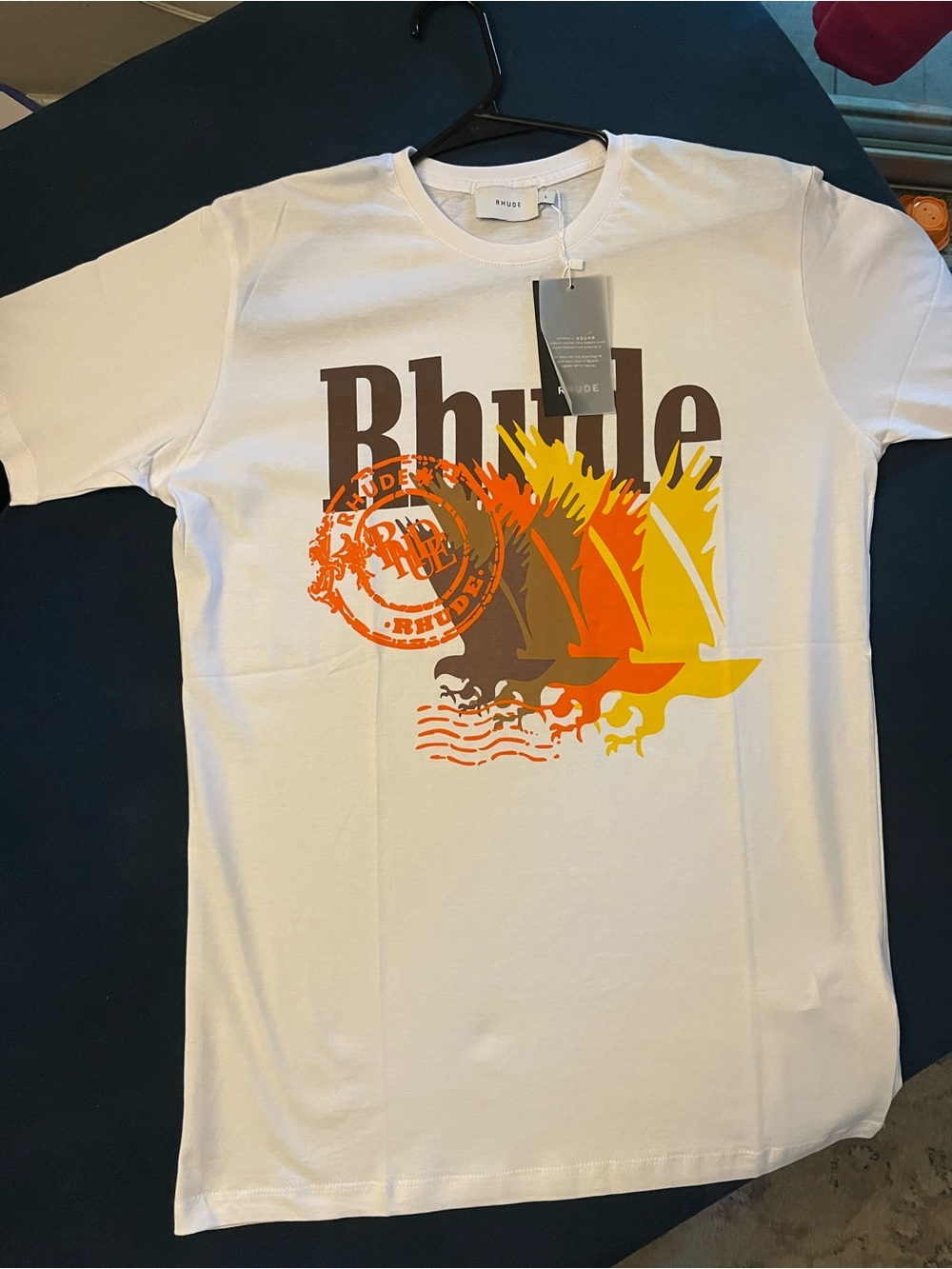 Rhude White Short-Sleeve Logo Tee with Orange, Yellow & Brown Graphic